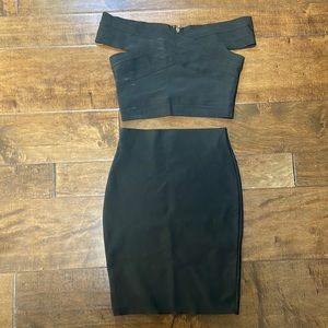 Black 2 piece top/skirt set.
